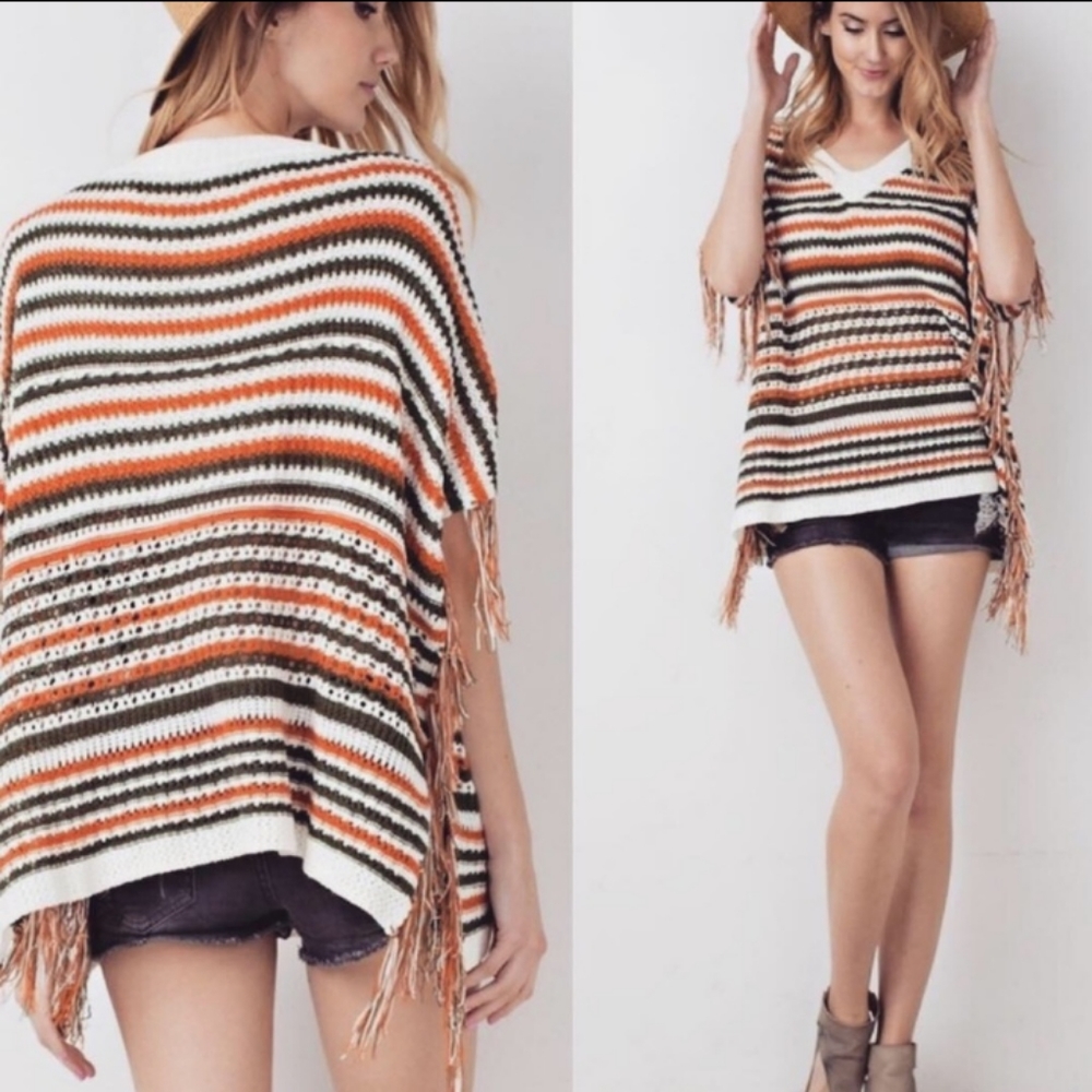 NWT. Oversized striped knit fringed poncho.